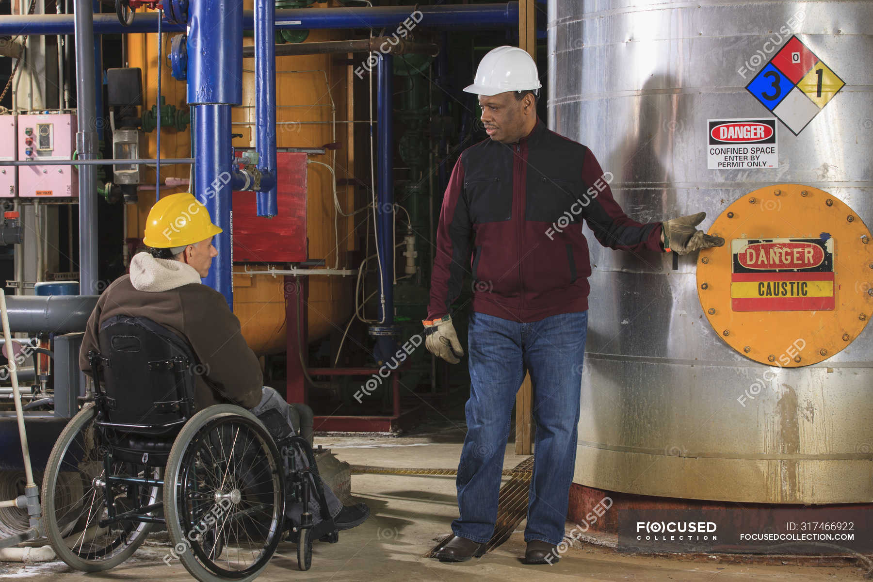 power-plant-engineers-one-with-spinal-cord-injury-discussing