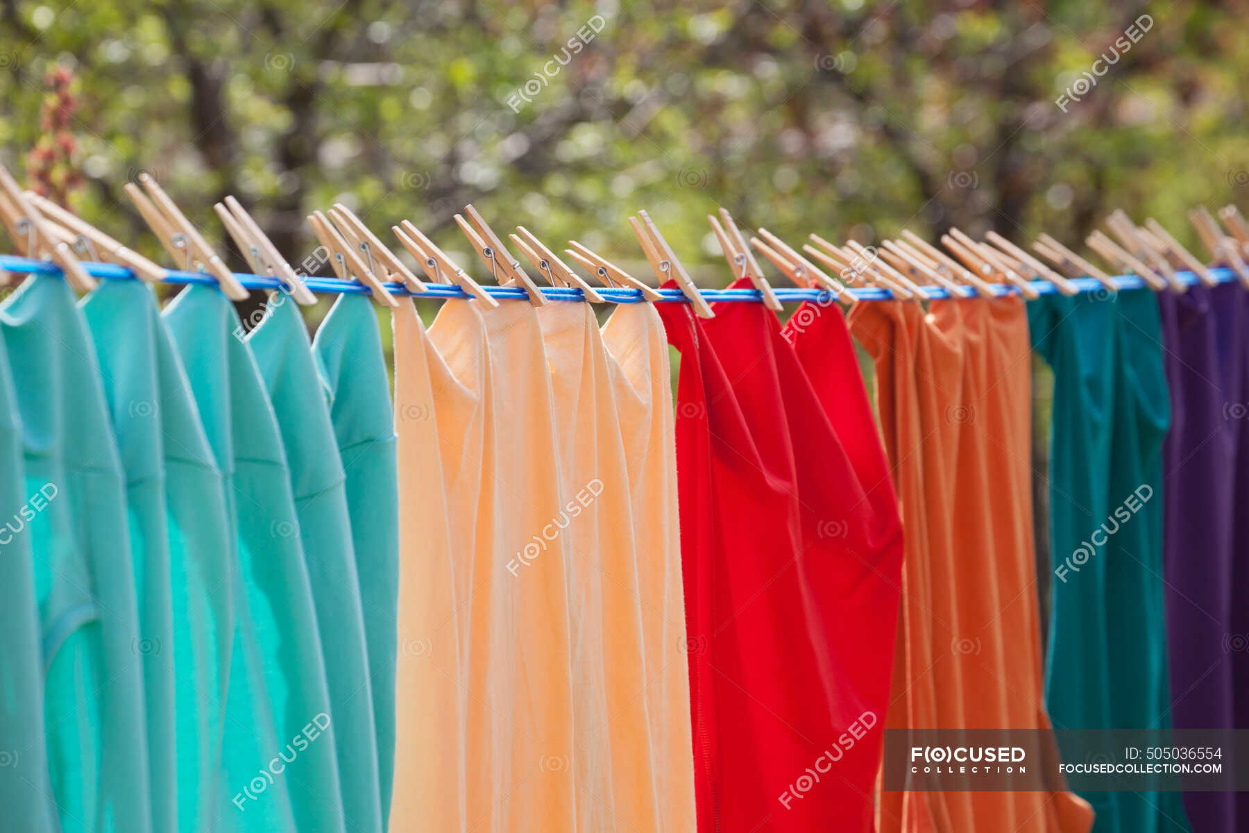 close-up-of-colourful-clothes-hanging-on-a-clothes-line-with-clothes