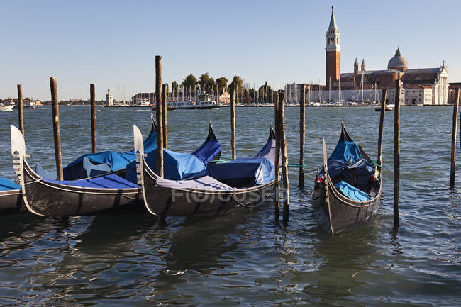 Boats In Lagoon With Church — Stock Photo