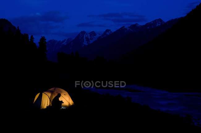 Lidderwat Kashmir India; Tenting In The Wilderness during nighttime with  person in camp — terrain, season - Stock Photo | #162675274