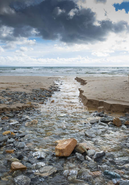 View of beach with stream — Stock Photo
