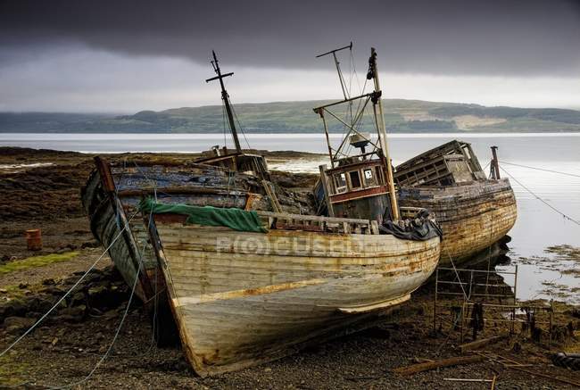 Three abandoned boats — Stock Photo