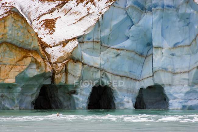 Iceberg Glacier with arch — Stock Photo