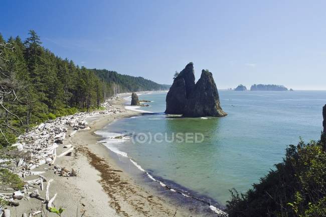 Sandy beach with rocks — Stock Photo