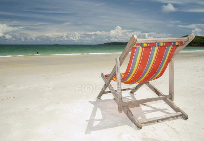 Deck Chair On Sand — Stock Photo