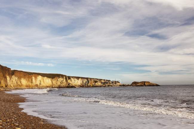 Marea lungo la costa in Inghilterra — Foto stock