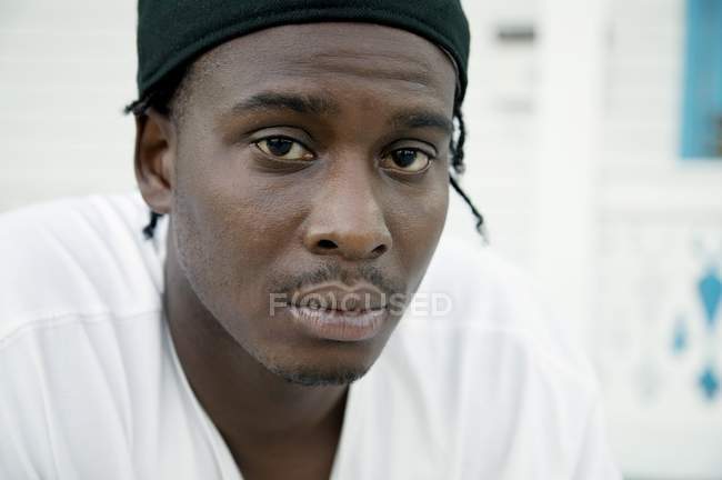Portrait of african american man in headband — Stock Photo