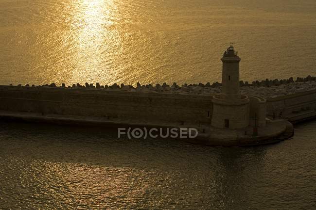 Faro de rompeolas, Puerto de Livorno - foto de stock