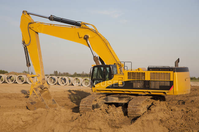 Backhoe Digging For Sewer Installation — Stock Photo