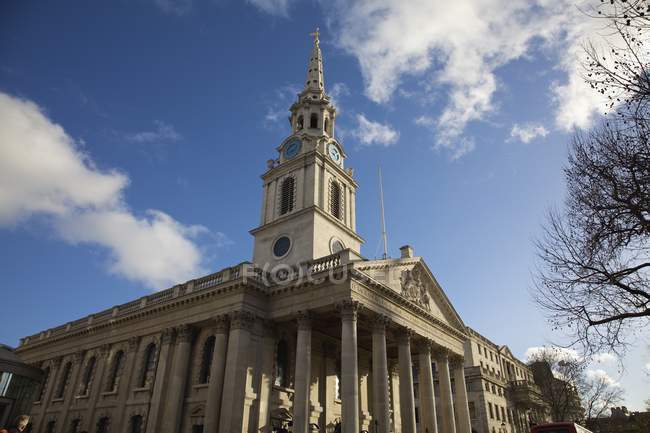 Clock Tower And A Spire — Stock Photo