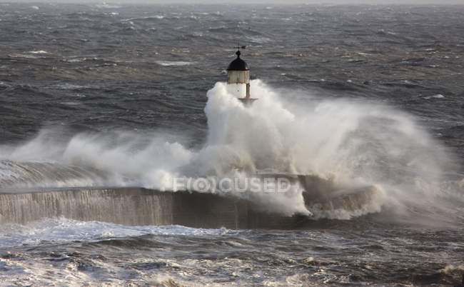Waves Crashing On A Lighthouse — Stock Photo
