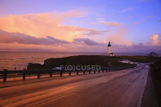 Road And Lighthouse Along Coast — Stock Photo