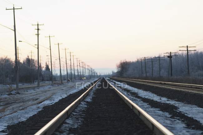 Trilhas de trem ao longo do gelo — Fotografia de Stock