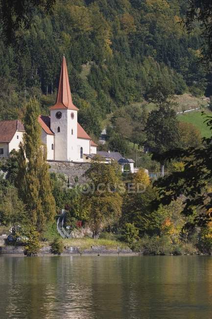 Church  on slope of hill — Stock Photo