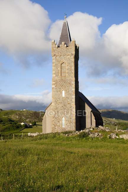 Old church over green grass — Stock Photo