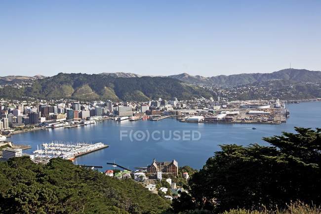 View of city against sea water — Stock Photo