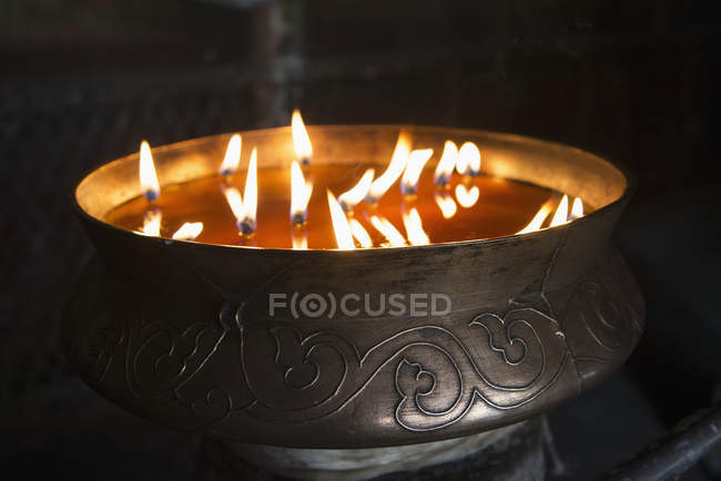 Flames burning in container — Stock Photo