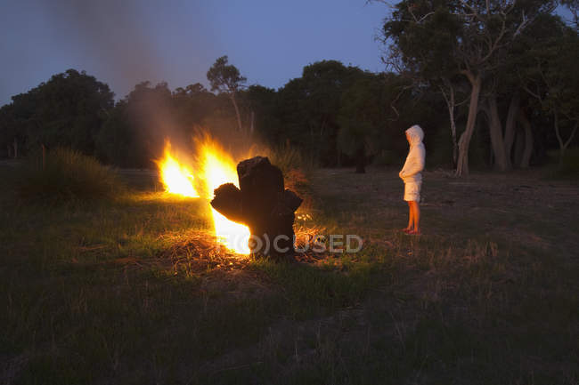 Standing by a large bonfire;Dunsborough west australia australia — Stock Photo