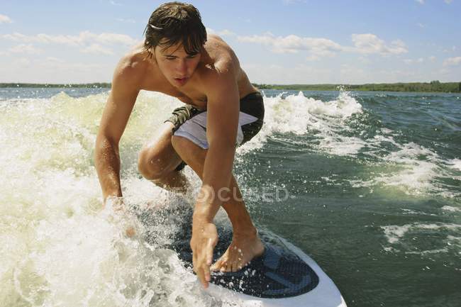 Adult extreme athlet on surfing board. Tarifa, Cadiz, Andalusia, Spain — Stock Photo