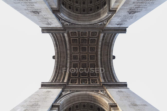 Upwards view of Arc de Triomphe — Stock Photo
