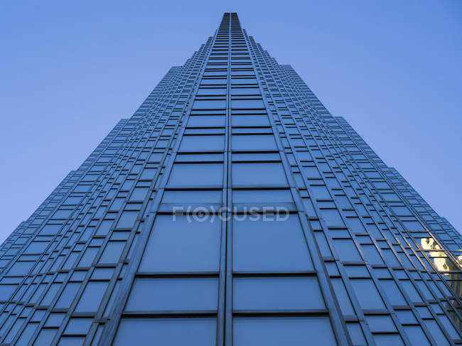 Facade of skyscraper with blue facade — Stock Photo