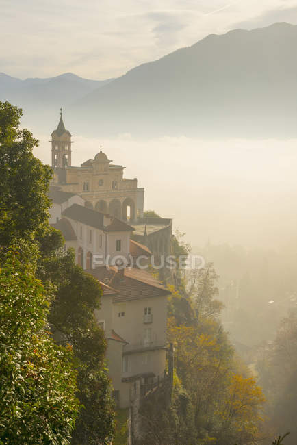 Fog sets in over a church — Stock Photo