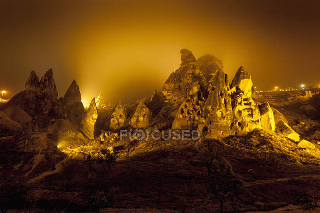 Cave homes in rock formations — Stock Photo