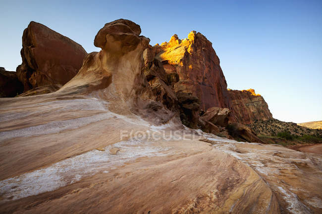 Smooth, worn rock formations — Stock Photo