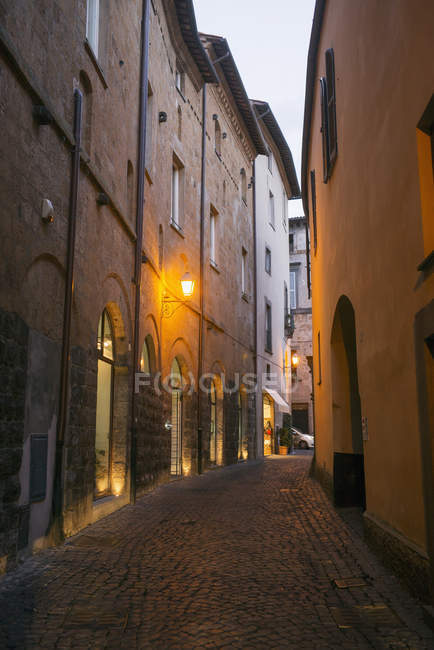 Narrow street between buildings — Stock Photo
