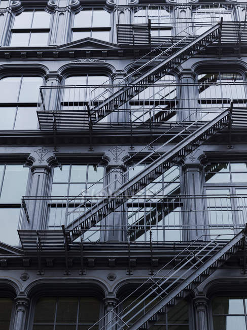 Fire escapes on side — Stock Photo