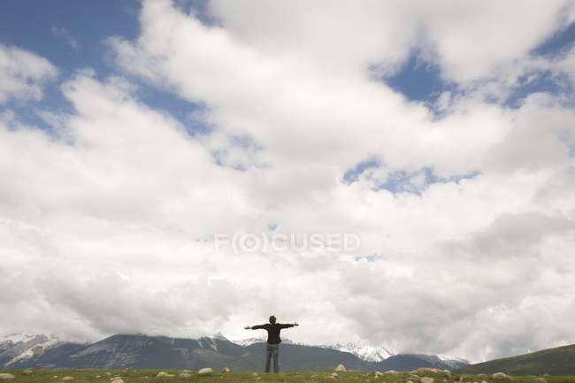 Person With Arms Outstretched — Stock Photo