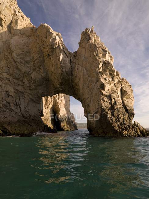 Rock arch over water — Stock Photo
