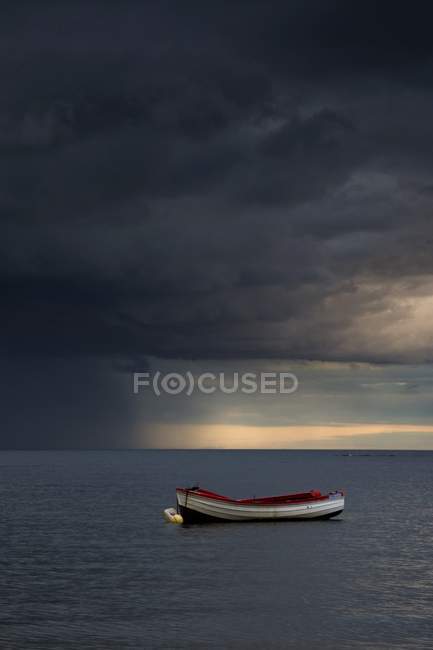 Boat Moored in open sea — Stock Photo