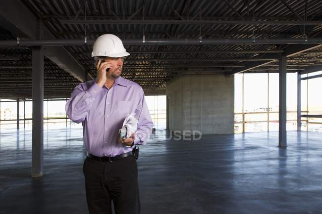 Architect With Blueprint And Phone — Stock Photo