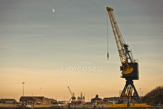 Crane And Buildings outdoors — Stock Photo