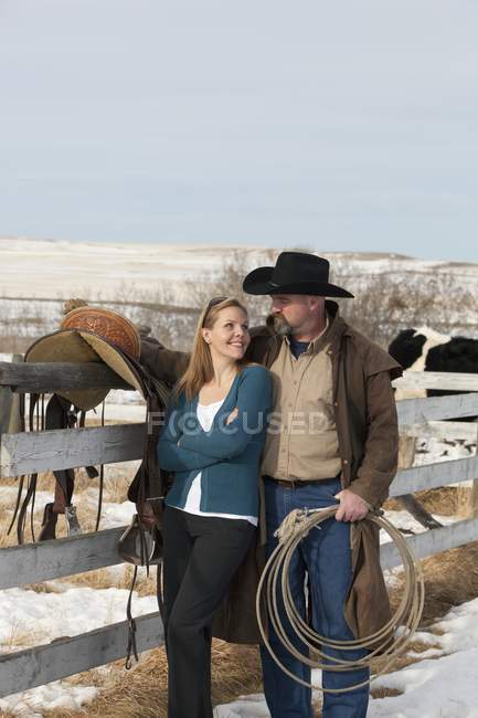 Happy caucasian adult couple on ranch — Stock Photo