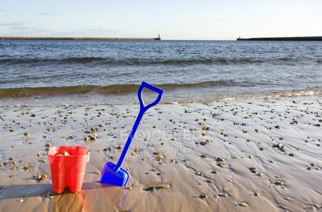 Bucket And Shovel On Beach — Stock Photo