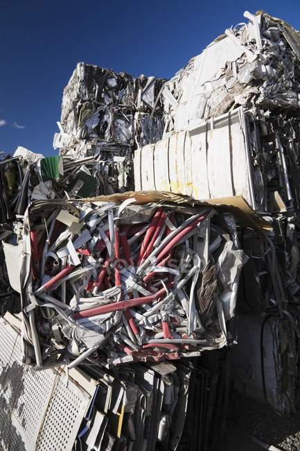 Junk yard with stack of metal trash — Stock Photo