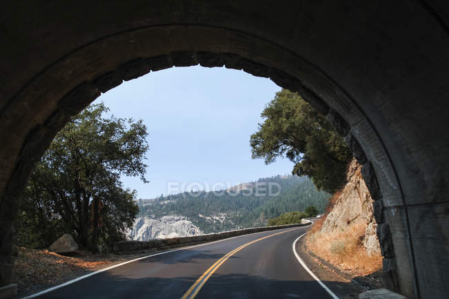 Tunnel on the open road in Yosemite National Park; California, United States of America — Stock Photo