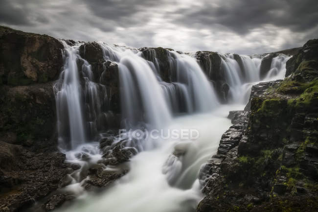 Moody image of waterfalls in the central area of Iceland in a long exposure; Iceland — Stock Photo
