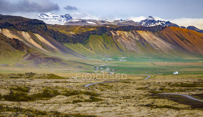 Beautiful long view across the colourful landscape of a valley from a tourist lookout, Iceland — Stock Photo