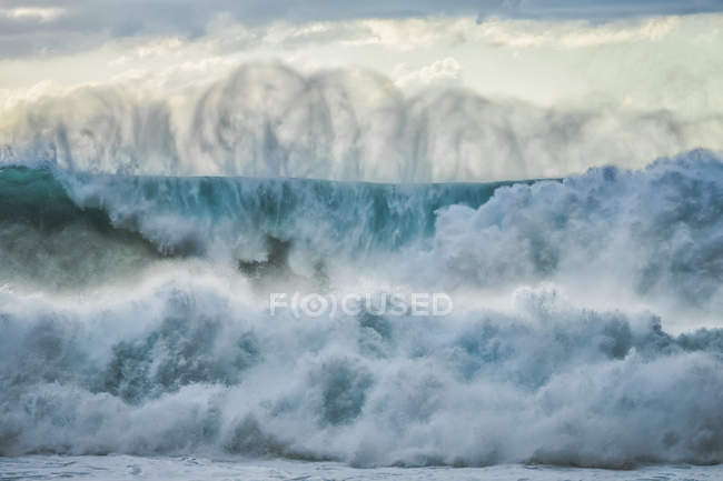 Huge waves in the ocean surrounding Oahu; Oahu, Hawaii, United States of America — Stock Photo