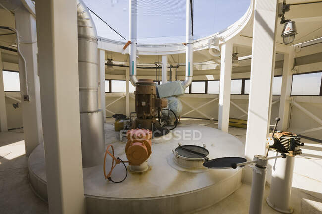 Industrial valves and a motor in a sludge digester — Stock Photo