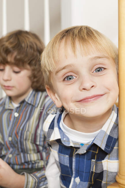 Portrait of two brothers at home together — Stock Photo