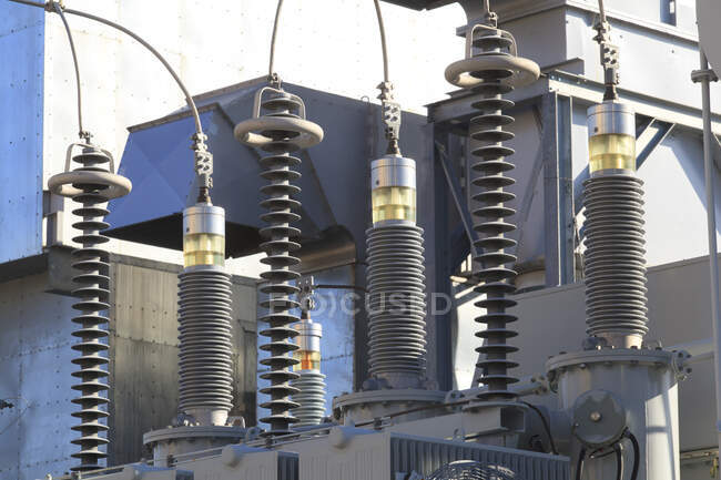 High voltage transformers at electric plant — Stock Photo