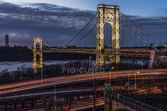 George Washington Bridge at twilight, lit specialty for Martin Luther King Jr. Day (MLK Day); New York City, New York, USA — Stock Photo
