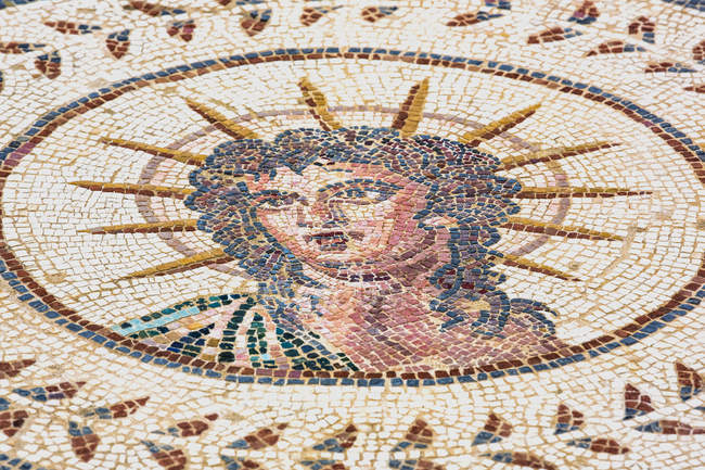 Tiled artwork of medusa, Roman ruins of street art; Spain - foto de stock