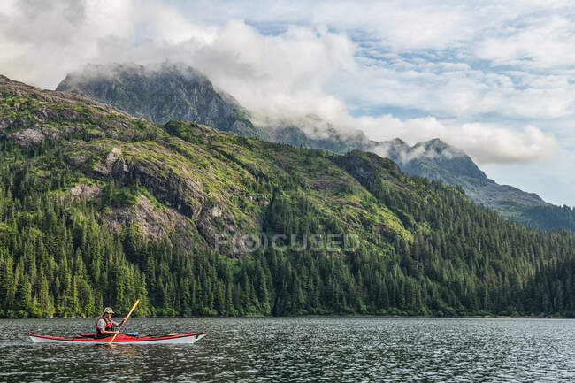 Kayaker paddling in Prince William Sound; Alaska, United States of America — Stock Photo