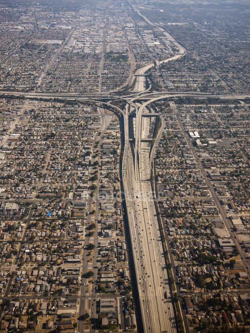 Aerial view of cityscape showing dense urban areas and roadways; Los Angeles, California, United States of America — Stock Photo