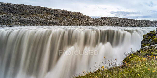 Dettifoss Waterfall, reputed to be the second most powerful waterfall in Europe after the Rhine Falls; Nordurping, Northeastern Region, Iceland — Stock Photo